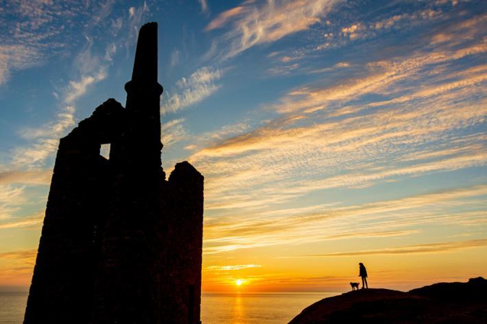 Silhouette of mine stacks at Botallack, at sunset