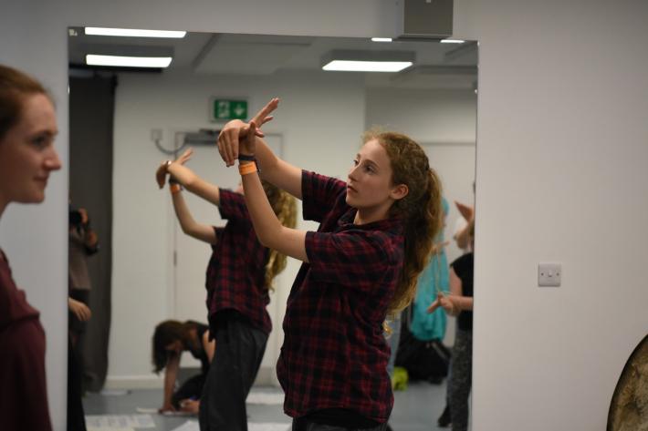 Young people participating in a workshop